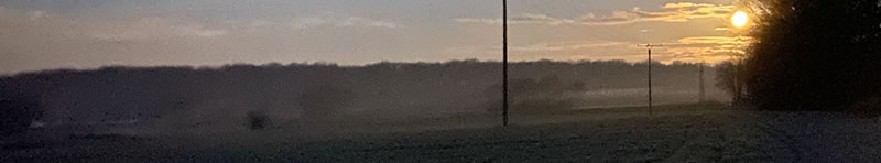 Sonnenaufgang über Feldern bei Dormagen